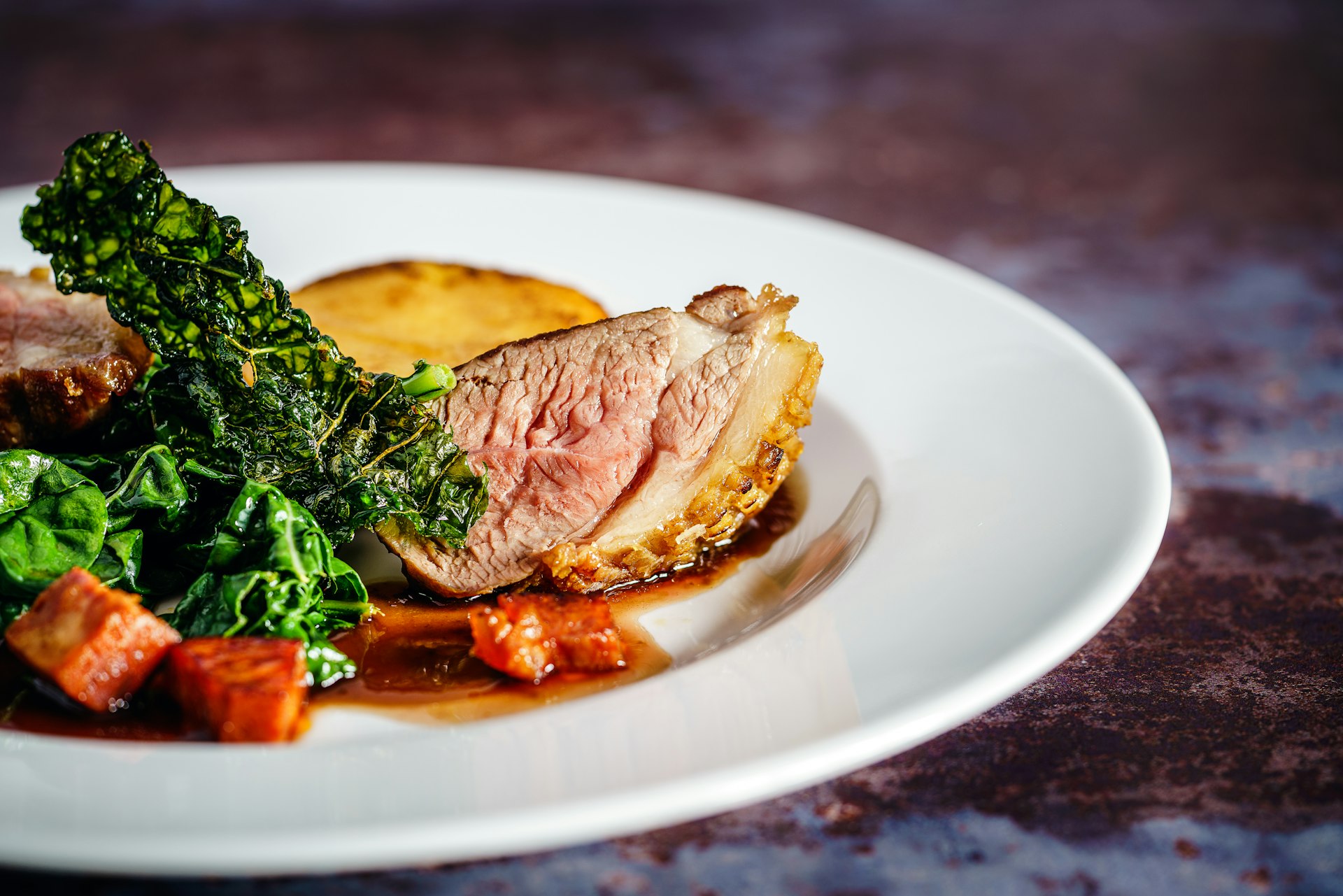 cooked meat on white ceramic plate